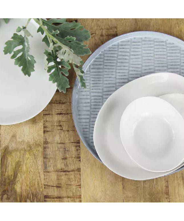 Hvid organisk formet porcelænstallerken